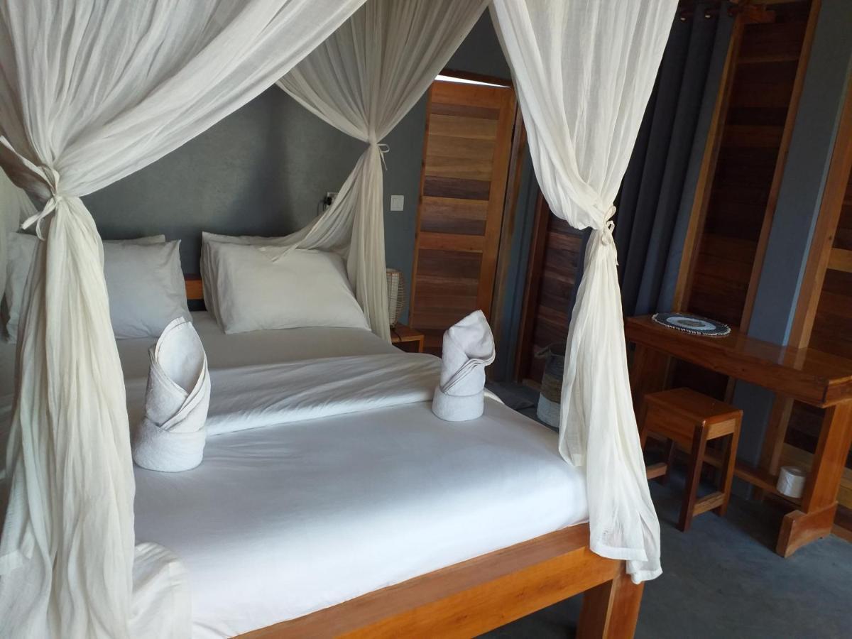The Geckos Homestay Kelimutu Bilik gambar